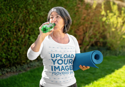 3/4 Sleeve T-Shirt Mockup of a Mature Woman Drinking Water After a Yoga Session 45607-r-el2