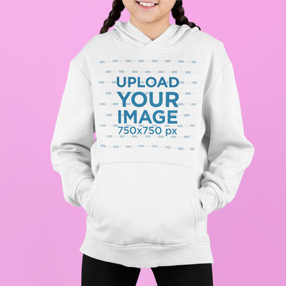 Mockup of a Girl Posing with Her Hands in the Pocket of Her Hoodie