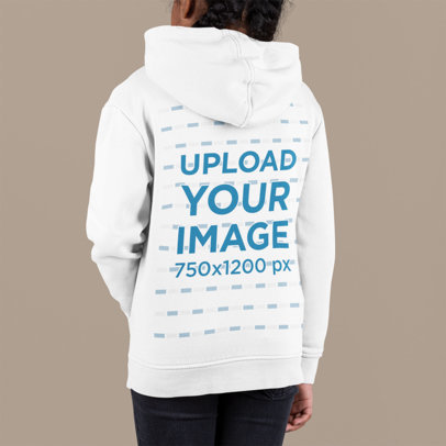 Back-View Mockup of a Girl Wearing a Pullover Hoodie at a Studio 
