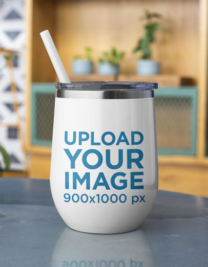 Mockup of a Wine Tumbler Placed on a Table