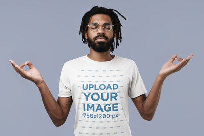 T-Shirt Mockup Featuring a Bearded Man with a Meditating Hand Gesture