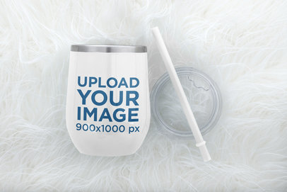 Mockup of a Wine Tumble Lying on a Fur Fabric m235