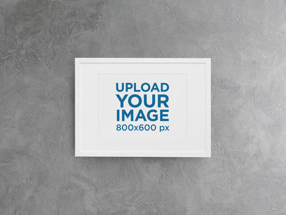 Minimal Mockup Featuring a Framed Art Print Hanged on a Grey Wall