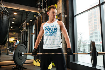 Tank Top Mockup of an Athletic Man Lifting Weights