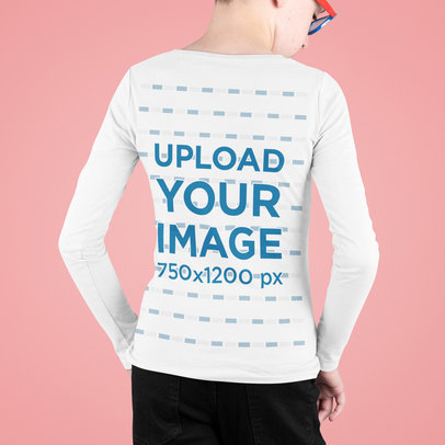 Back-View Mockup of a Kid Wearing a Long Sleeve Tee at a Studio