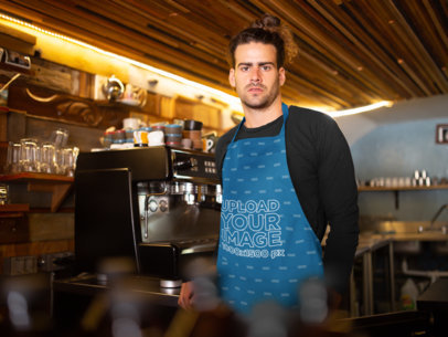 Mockup of a Long-Haired Man Wearing an Apron at a Bar 19888a