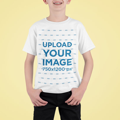 T-Shirt Mockup of a Happy Boy Standing in a Studio