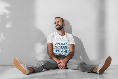T-Shirt Mockup of a Bearded Man Sitting on the Floor 45700-r-el2