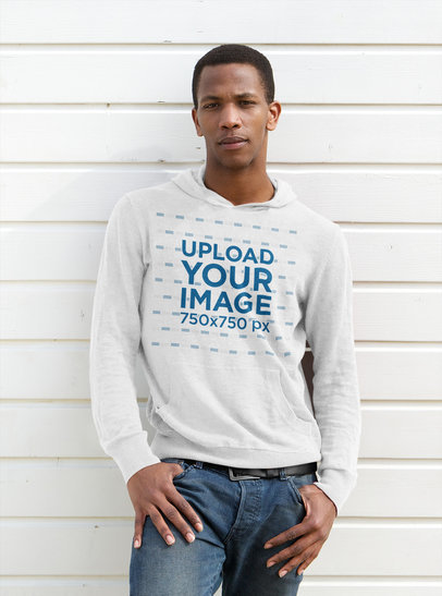 Pullover Hoodie Mockup Featuring a Man Leaning Against a Wall 