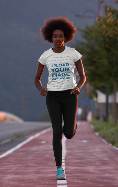 Activewear T-Shirt Mockup of a Young Woman Running 