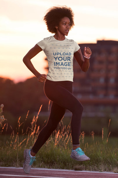 T-Shirt Mockup of a Woman Running in the Afternoon 