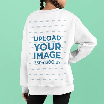 Back-View Mockup of a Girl Wearing an Oversized Sweatshirt