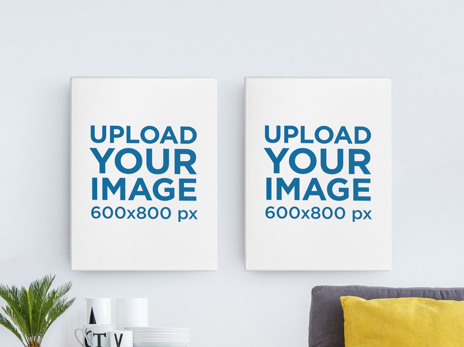 Canvas Mockup Featuring Two Art Prints Hanging in a Living Room 