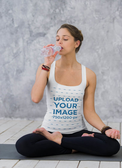 Tank Top Mockup of a Woman Drinking Water After a Yoga Class 