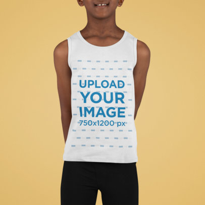 Mockup of a Smiling Kid Wearing a Tank Top at a Studio 