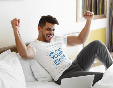 T-Shirt Mockup of a Man Cheering on the Bed 45734-r-el2
