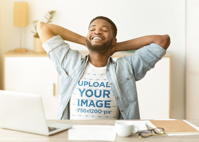 T-Shirt Mockup Featuring a Bearded Man Doing Home Office