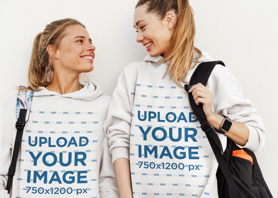 Mockup Featuring an LGBTQ Couple Wearing Matching Hoodies