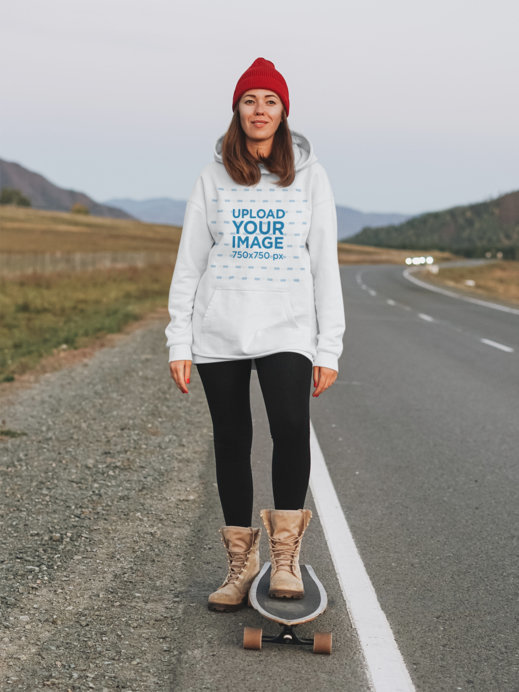 Pullover Hoodie Mockup of a Woman Skating on an Empty Highway 