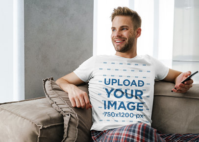 T-Shirt Mockup of a Man Chilling at Home in Pajamas