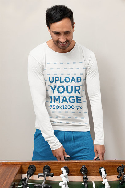 Long-Sleeve Tee Mockup of a Man Playing Table Soccer