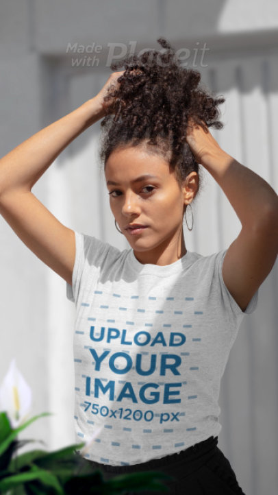 Parallax Video of a Curly-Haired Woman Wearing a T-Shirt