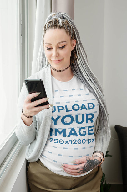 T-Shirt Mockup of a Pregnant Woman with a Hand Tattoo