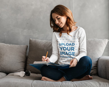 Long Sleeve Tee Mockup of a Young Woman Doing Her Homework