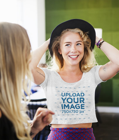 Heathered Crop Top Mockup Featuring a Smiling Woman with an Arm Tattoo