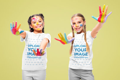 T-Shirt Mockup of Two Girls Playing with Paint