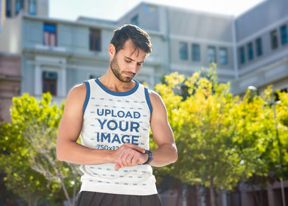 Ringer Tank Top Mockup of a Man Checking His Running Time