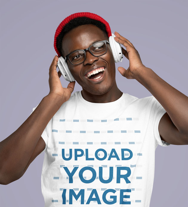 Mockup of a Joyful Man Wearing a Basic T-Shirt and Listening to Music 