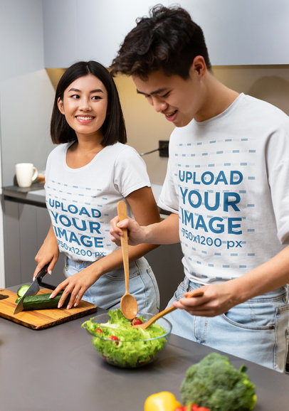 T-Shirt Mockup of a Young Couple Preparing Healthy Food