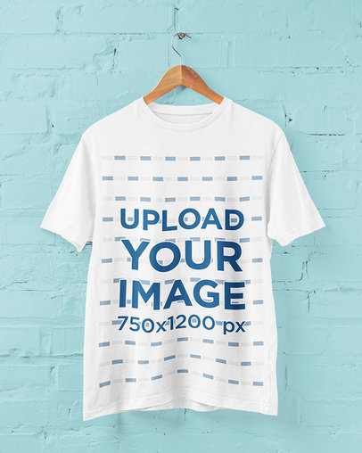 Mockup of a T-Shirt Hanging on a Customizable Wall