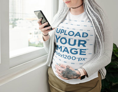 T-Shirt Mockup Featuring a Pregnant Woman with a Tattoo 