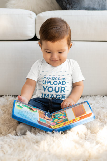 T-Shirt Mockup of a Baby Boy Reading a Book