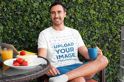 T-Shirt Mockup of a Man in Pajamas Enjoying a Coffee