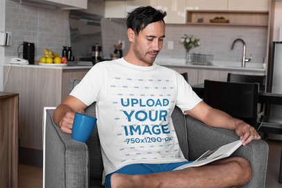 T-Shirt Mockup of a Man in Pajamas Reading at Home