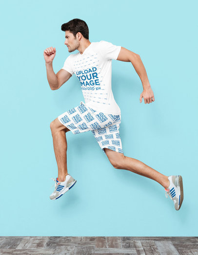 T-Shirt and Sublimated Shorts Mockup of an Athletic Man in a Dynamic Pose