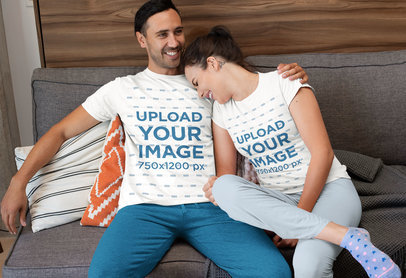 T-Shirt Mockup of a Funny Couple Wearing Pajamas at Home