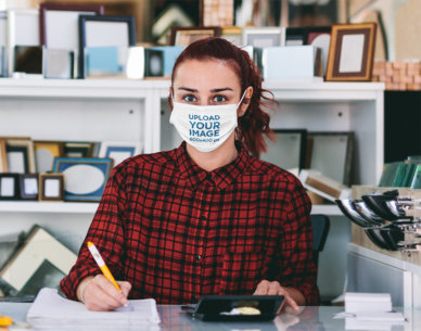 Face Mask Mockup of a Woman at a Custom Frame Shop 46119-r-el2