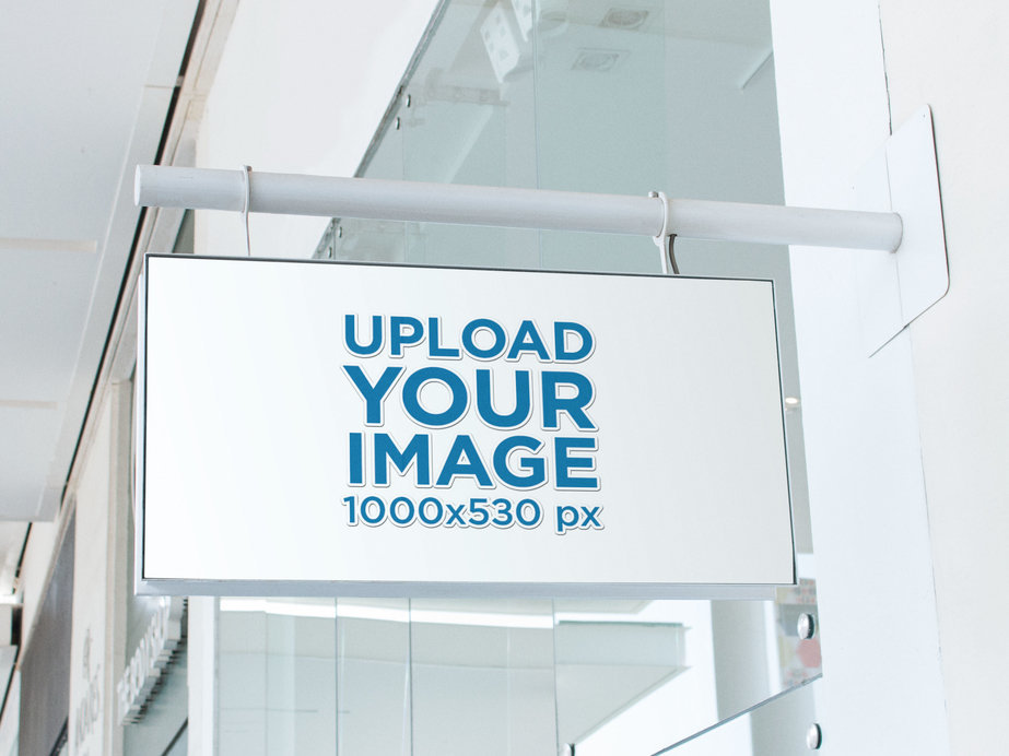 Rectangular Sign Mockup Outside a White Store