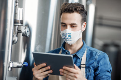Face Mask Mockup Featuring a Brewer at Work