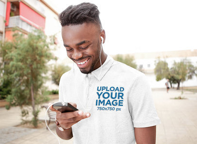 Polo Shirt Mockup of a Happy Man Listening to Some Music