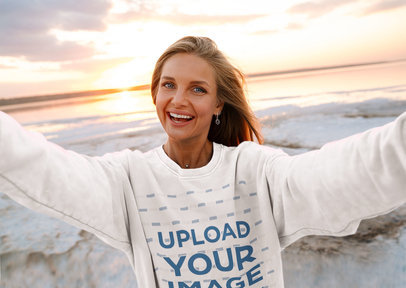 Sweatshirt Mockup of a Smiling Woman Taking a Selfie 