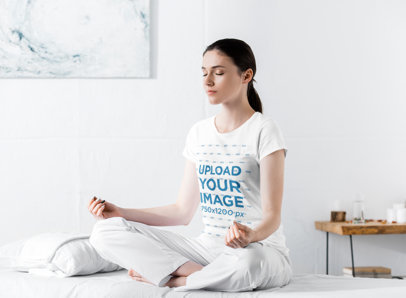 T-Shirt Mockup of a Woman Meditating Sitting on a Massage Bed 46020-r-el2