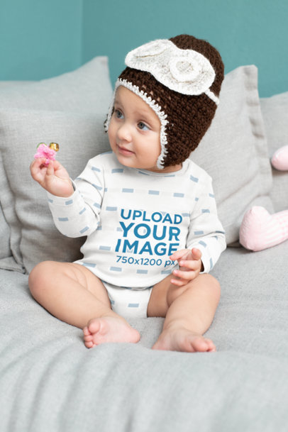 Onesie Mockup Featuring a Baby with a Knitted Garment