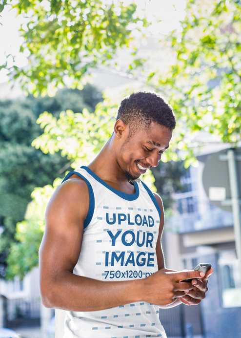 Ringer Tank Top Mockup of a Man Checking His Phone