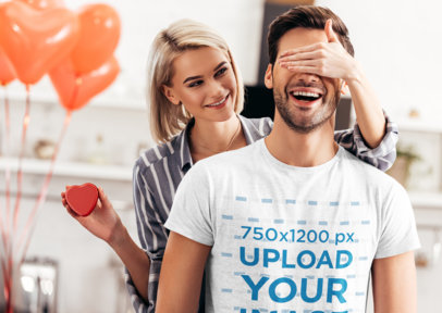 Heathered T-Shirt Mockup of a Man Getting a Valentine's Day Surprise
