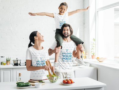 T-Shirt Mockup of a Happy Family Having Fun in While Cooking 